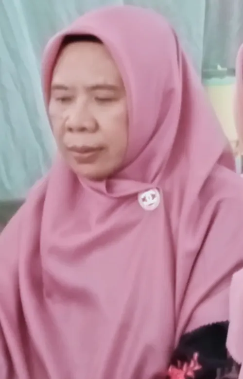 Dra. Hj. Suharni, M.Pd.